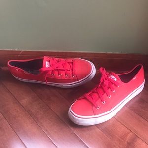 Red Keds lace up sneakers// warn once